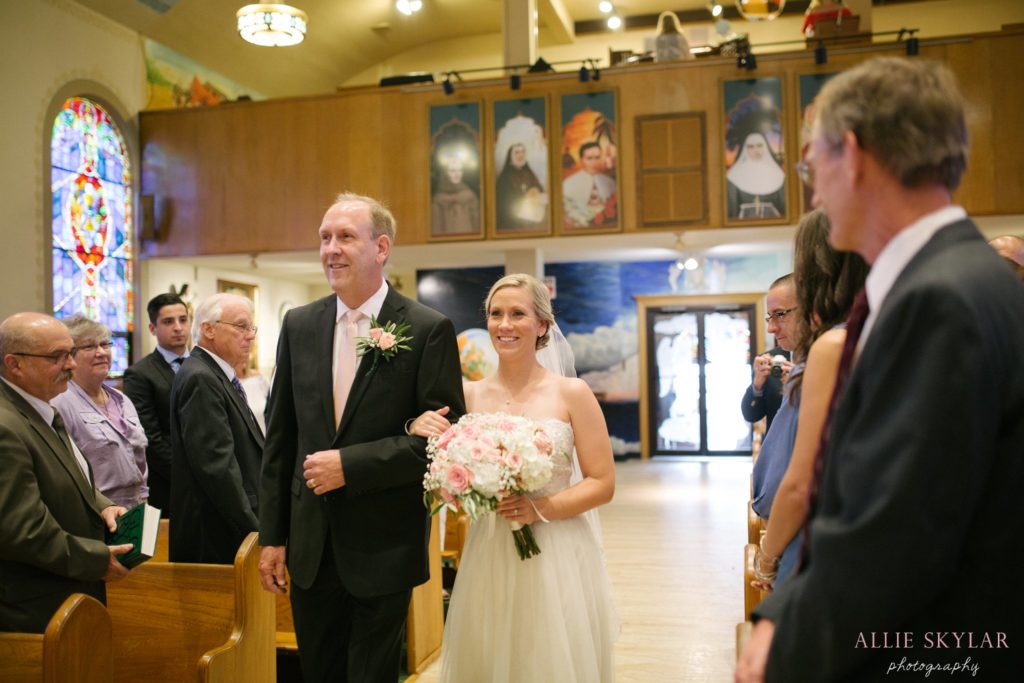 bride walks down the aisle at St Josephs in Berwick PA