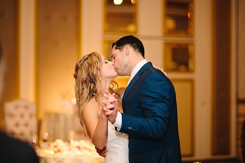 jewish bride and groom kiss in the ballroom at the grove NJ