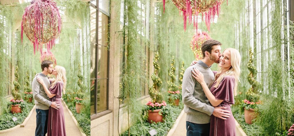 bride and groom kiss in the hallway at Longwood Gardens Christmas Spectacular