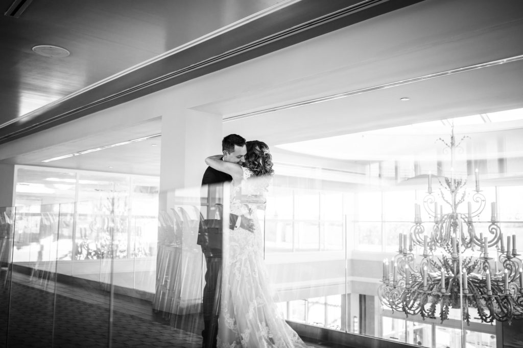 bride and groom first look at ocean place resort and spa in long branch NJ