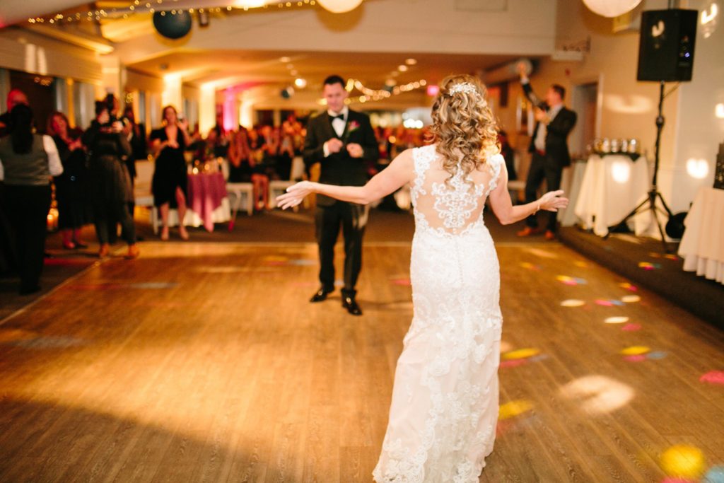 bride and groom share their first dance at McCloone's Pier House