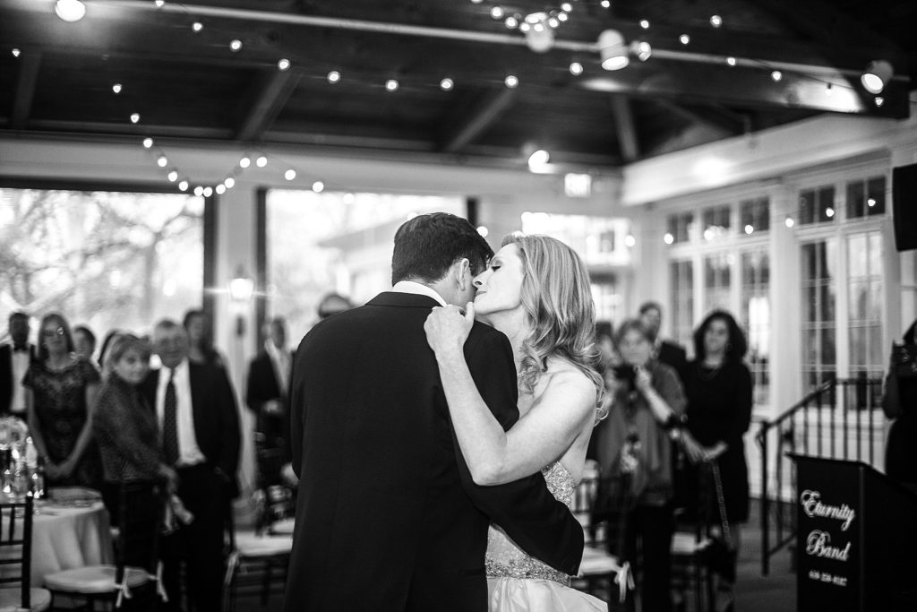bride and groom share their first dance at their reception at Gulph Mills Golf Club in Philadelphia PA
