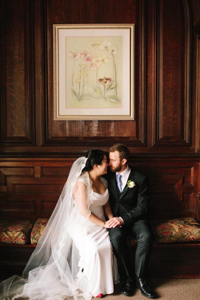 bride and groom embrace in romantic old house in fort washington PA