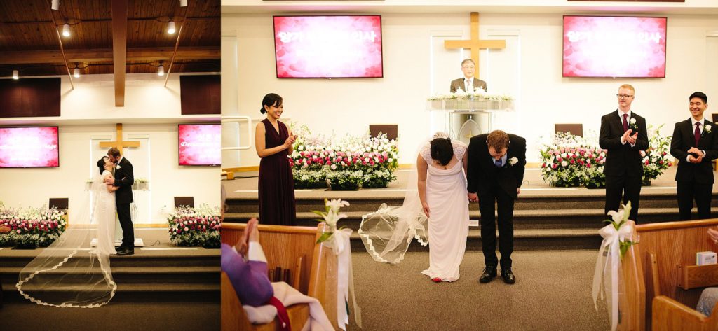 bride and groom bow to parents during their korean american wedding at the first korean Presbyterian church of Philadelphia