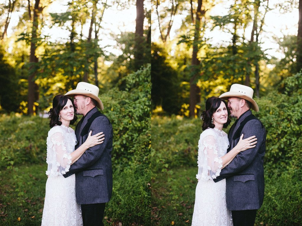 couple embrace during their anniversary session at valley forge national historic park