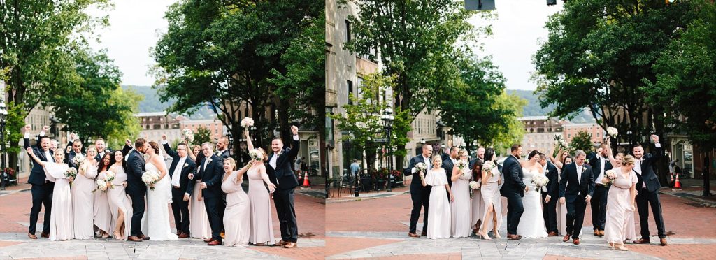 wedding party cheer in front of the historic hotel bethlehem in lehigh valley PA
