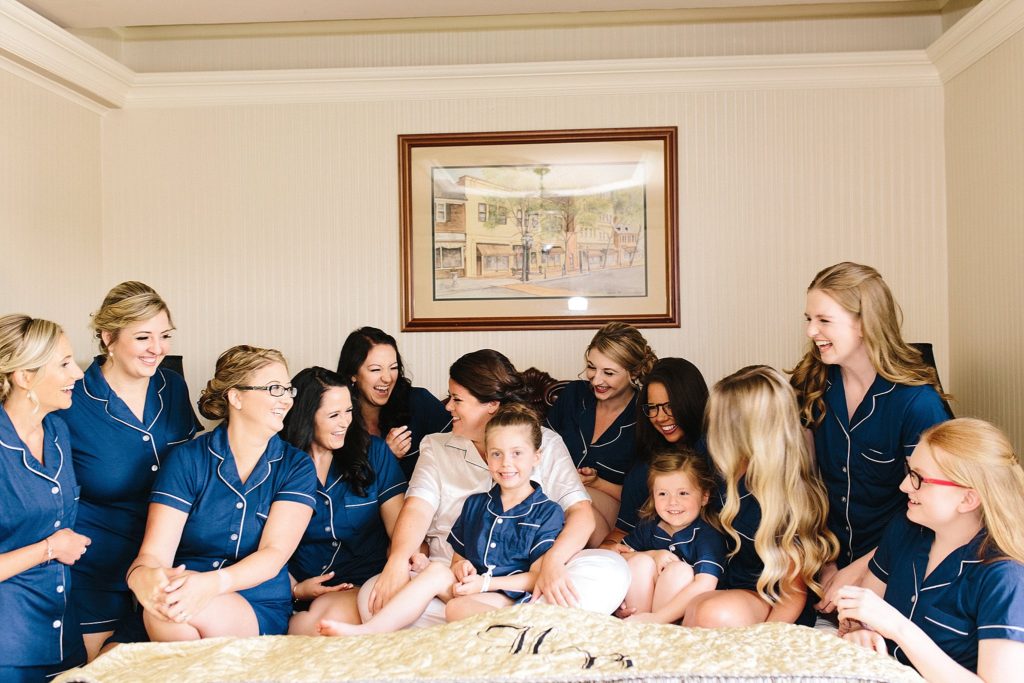 bride and bridesmaids wearing matching pajamas in their suite at the historic hotel bethlehem
