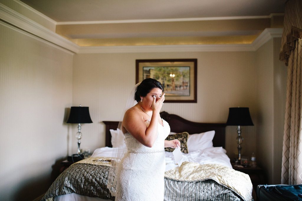 bride reads a letter from her soon to be husband at the historic hotel bethlehem