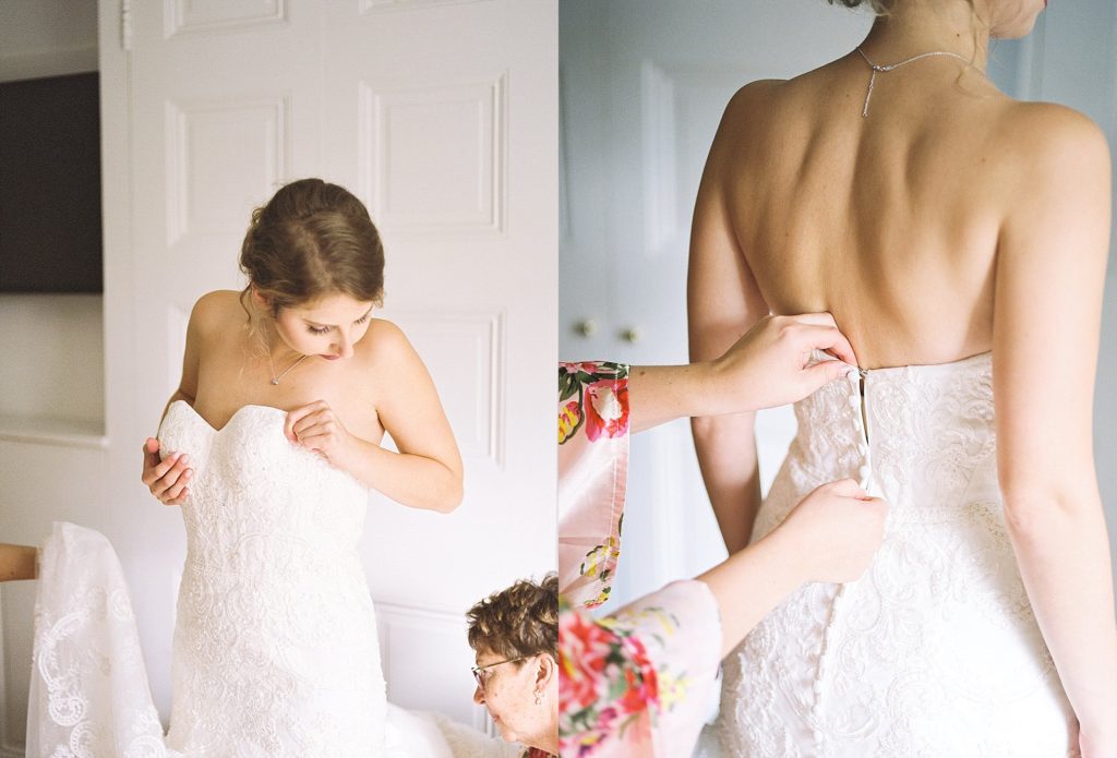 film wedding photography of Bride getting into her dress at Grace Winery