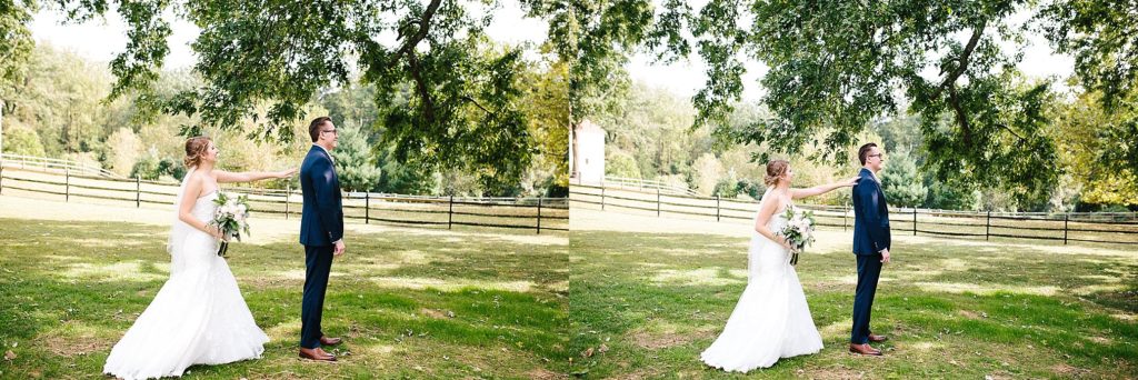 Beautiful first look between the bride and groom at Grace Winery