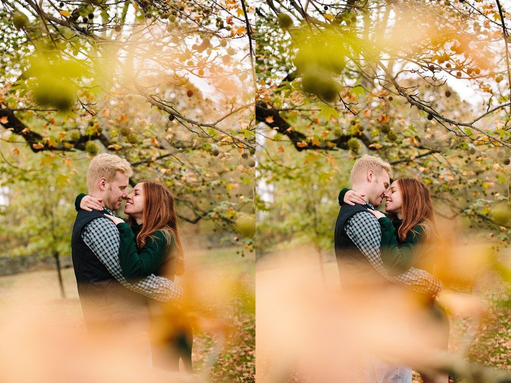 engaged couple embrace at longwood gardens during their engagement session