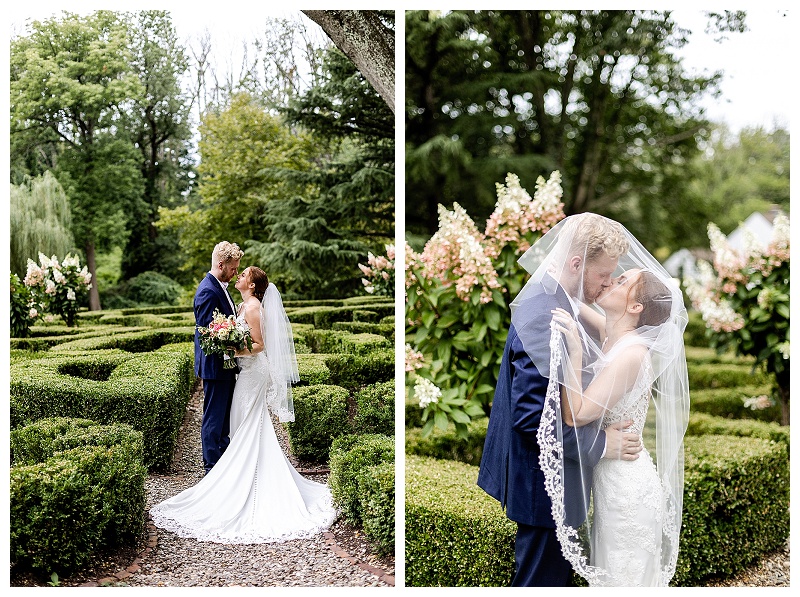 bride and groom pose for portraits in the gardens at Appleford Estate in Villanova PA during their summer wedding photographed by Allie Skylar Photography
