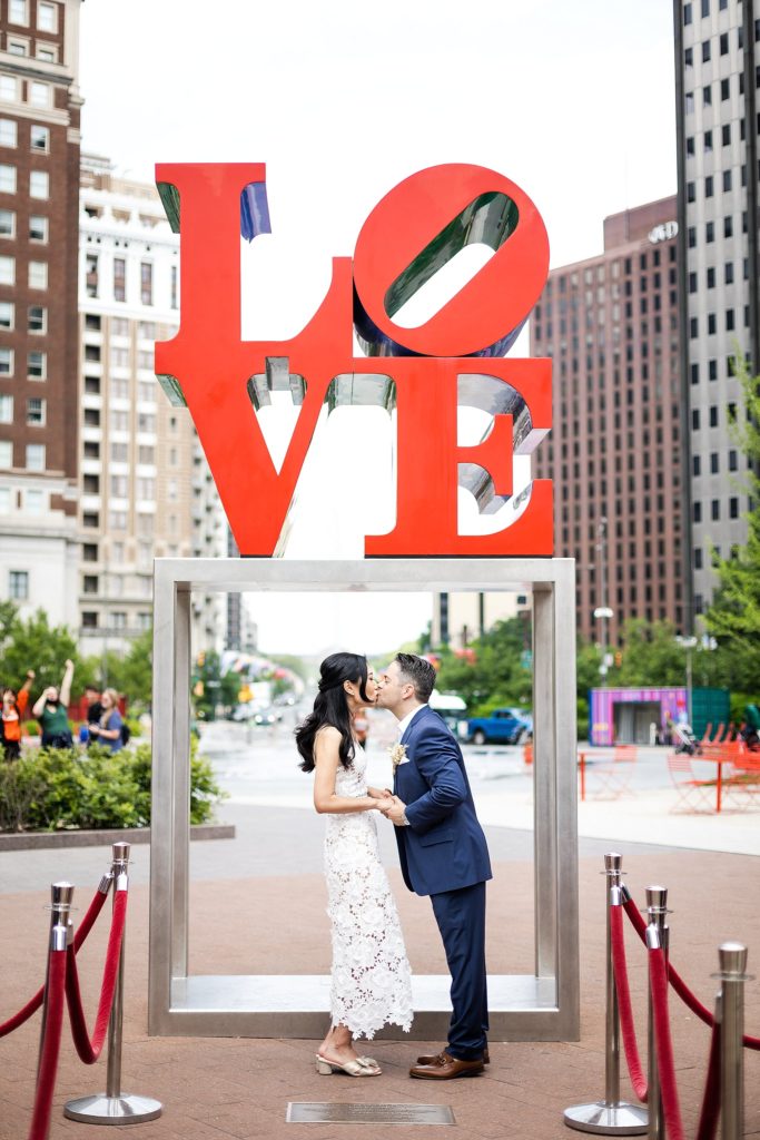 bride and groom get married at the historic love statue in love park, Philadelphia