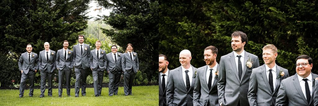 groom poses with groomsmen at the barn at boones dam