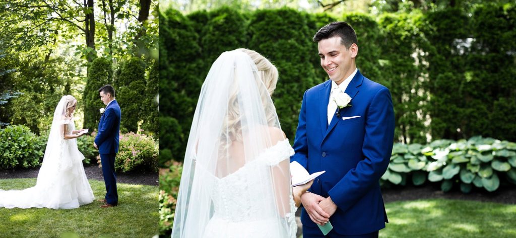bride and groom read vows during their first look at the william penn inn