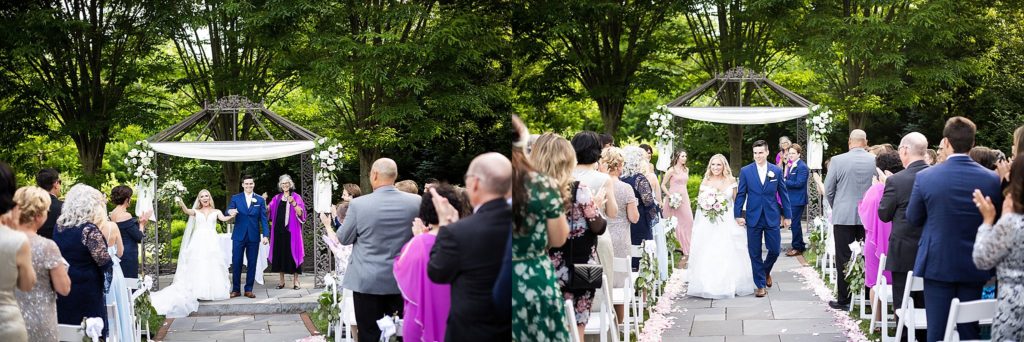 bride and groom walk down the aisle hand in hand after getting married at william penn inn
