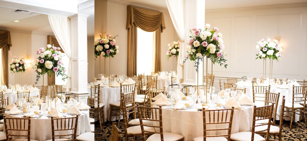elevated florals decorate the tables for a wedding reception at william penn inn